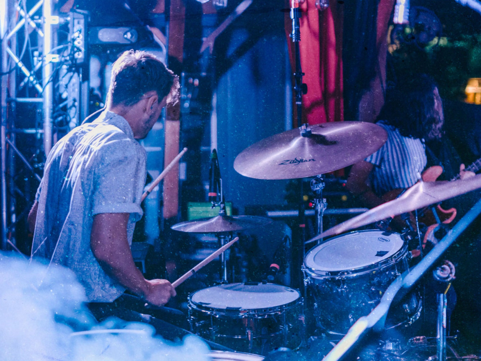 Drummer playing live music at Strange Festival